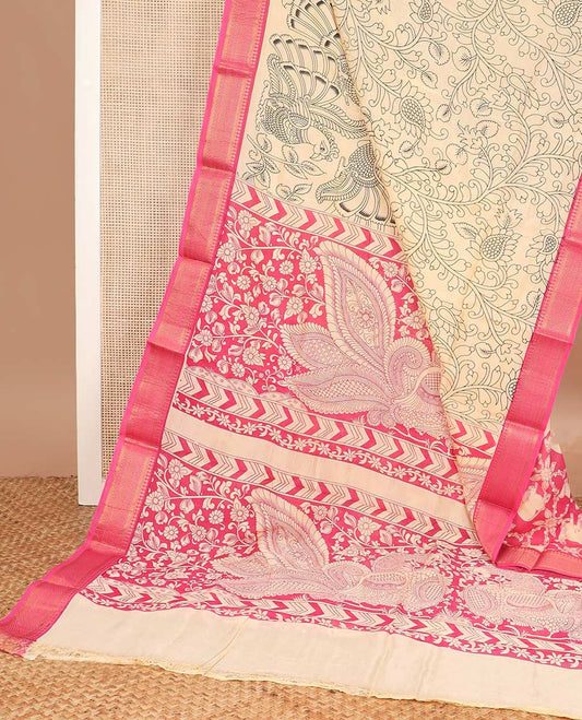 Light sandal flora-fauna motifs machine printed kalamkari cotton saree, contrast traditional zari blue border, and peacock printed pallu