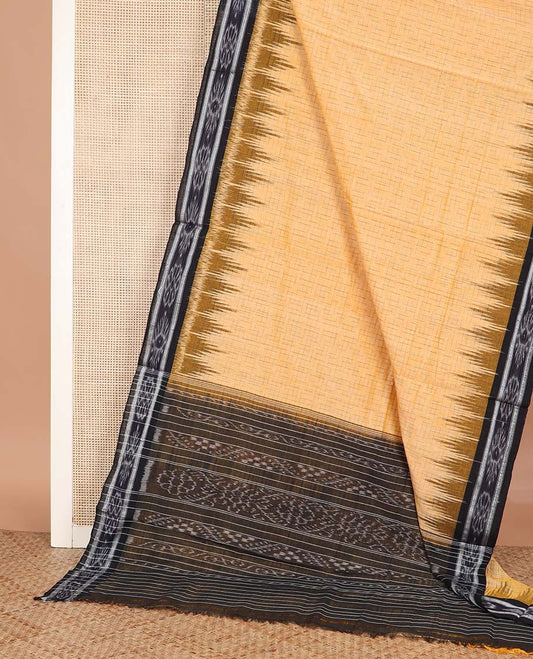 Yellow geometric maze style ikkat cotton saree, contrast black ikkat border, and pallu of ikkat weave