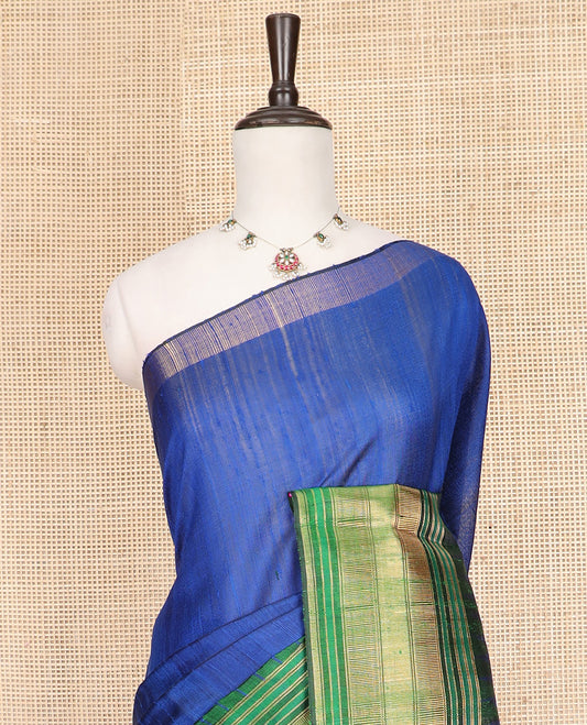 Royal Blue Plain Dupion Silk Saree, Elevated with a One-Sided Contrast Temple Border, Pallu Steeped with Zari Temple Designs, and Paired with a Contrast Blouse