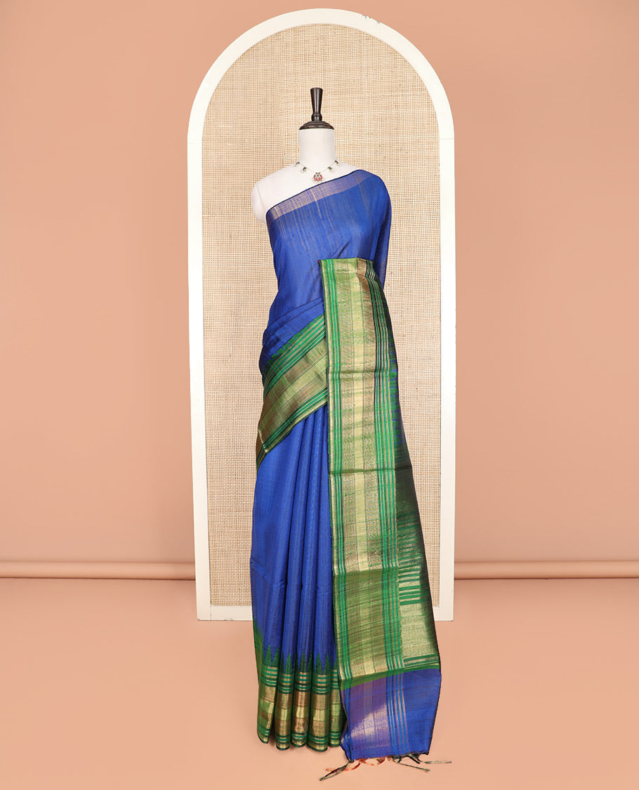 Royal Blue Plain Dupion Silk Saree, Elevated with a One-Sided Contrast Temple Border, Pallu Steeped with Zari Temple Designs, and Paired with a Contrast Blouse