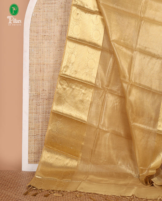 Gold sparsely checks Banaras tissue saree, big zari border of thilakam mokku, leaf motif & floral creeper & zari design blouse