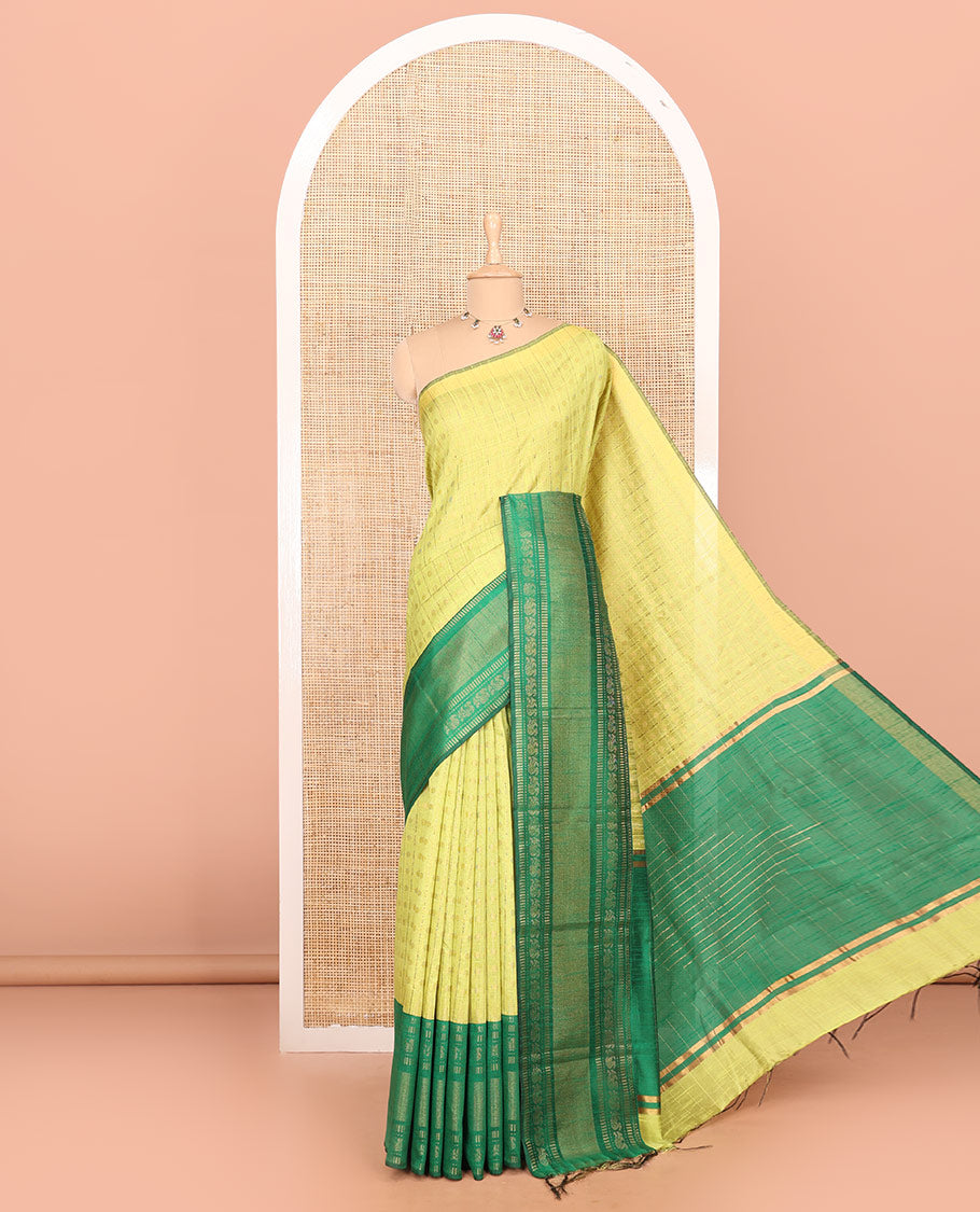 Parrot green polka dot butta enclosed checked semi-raw silk saree, contrast traditional zari design border, contrast diamond patterned pallu, and a contrast blouse