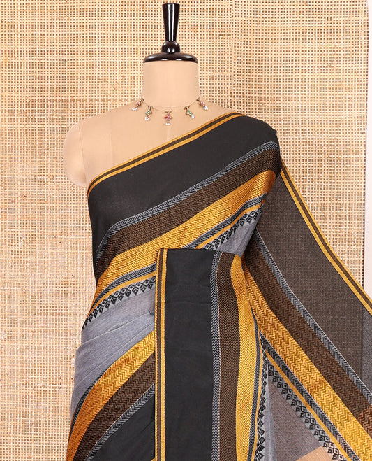 Grey-Block Plain Khadi Mul Cotton Saree, Complemented by a Contrast Thread-Woven Border of Geometric Patterns, Contrast Plain Pallu, and Paired with a Matching Blouse