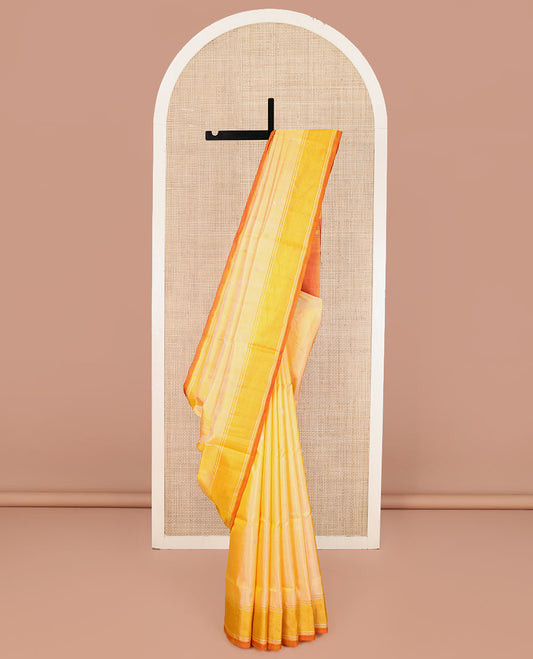 Yellow Uppada Silk Saree, Subtly Sparkled with Buttas All Over Its Body, Complemented by a Contrast Border, Pallu of Butta Enclosed Jaal Designs, and Paired with a Contrast Blouse
