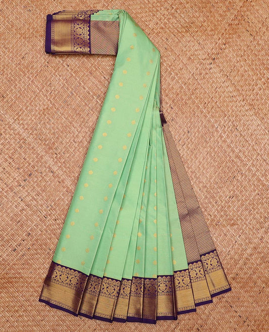 Green zari buttas gift saree, contrast traditional zari border, and jaal pallu