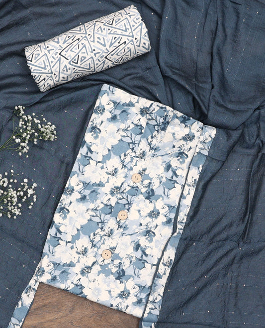 White and blue material chudidar set, floral printed with button work top, printed bottom, and sequins striped dupatta