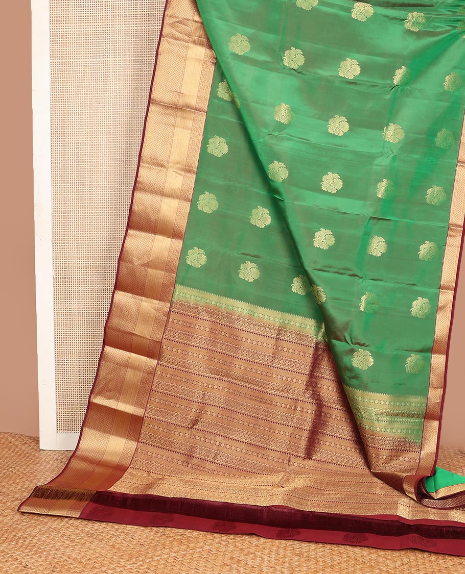 Green zari buttas Vasundhara silk mix saree, contrast border of rekku,diamond & jaal designs & pallu of rekku,rudraksham,manga & kodi visiry