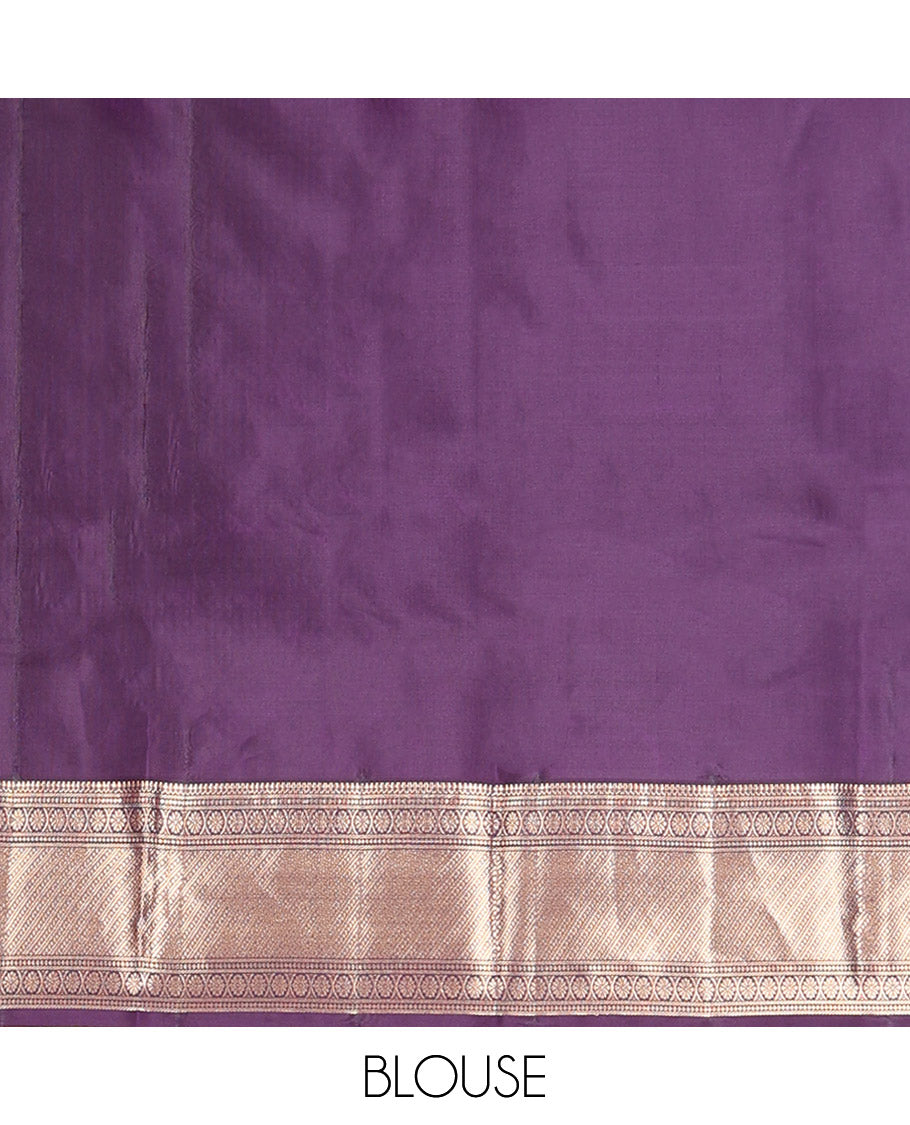 Blue Vasundhara Silk Saree, Richly Detailed with Stripes and Zari Buttas, Complemented by a Contrast Border of Thilakam Mokku, Laddu Kamalam, and Kodi Visiry and Mayil Designs, Mughal-Style Designed Pallu, and Paired with a Contrast Blouse