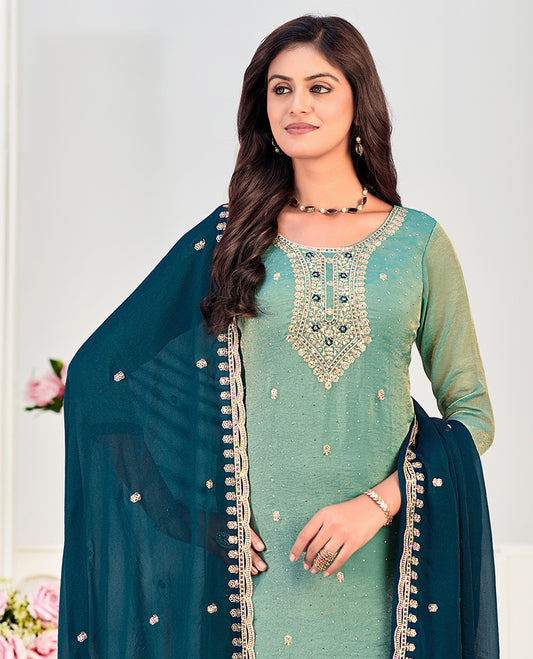 Turquoise churidar material set, neck embroidered with stone work top, contrast plain bottom, and scallop embroidered dupatta
