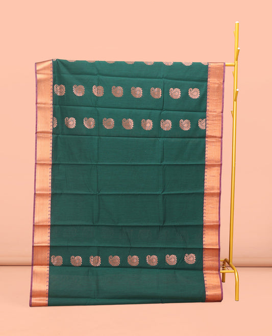 Green Semi-Silk Cotton Saree, Prettified with Paisley Buttas on Its Body, Complemented by Contrast Zari Border, Pallu Steeped with Paisley Designs, and Paired with a Matching Blouse