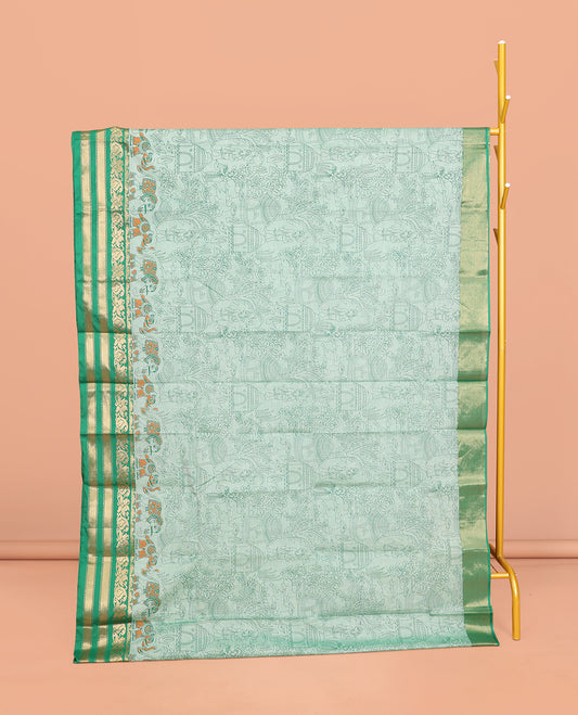 Green Andhra Cotton Saree, Mesmerized with Village-Themed Print, a Contrast Zari Border, a Pallu of Patola-Print, and a Matching Blouse