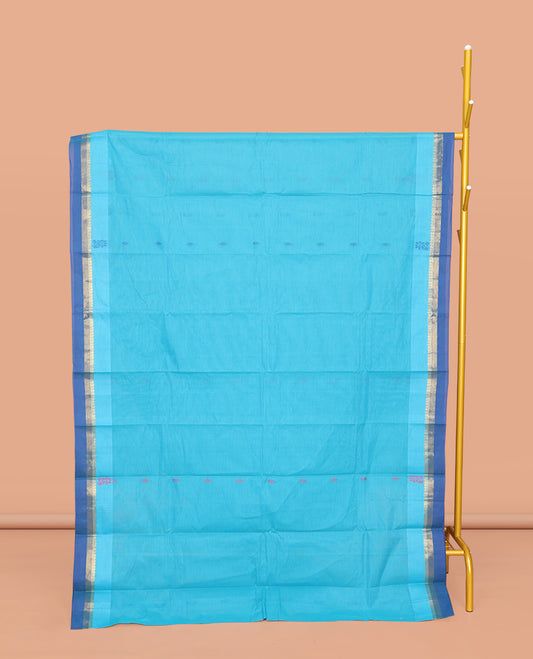 Blue Kanchi Cotton Saree, Accentuated with Buttas All Over Its Body, Complemented by a Contrast Border, Pallu of Paisley Designs, and Paired with a Matching Blouse