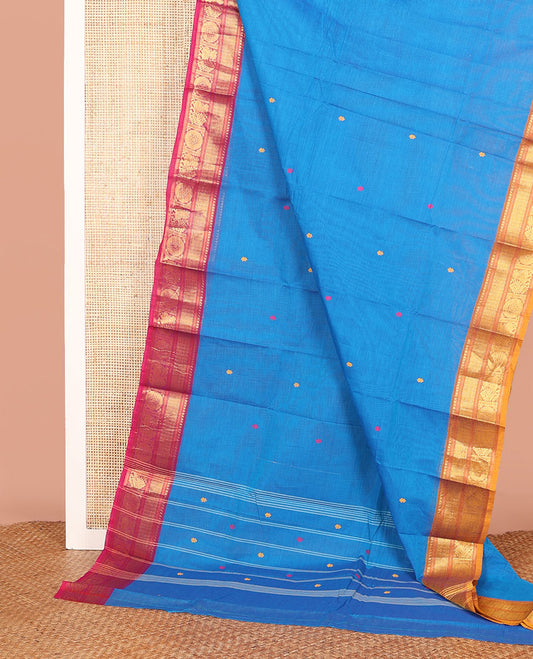 Blue Chettinad Cotton Saree Mesmerized with Thread Buttas All Over Its Body, Complemented by a Contrast Traditional Zari Motifs Woven Ganga Jamuna Border, and a Pallu of Stripes and Buttas