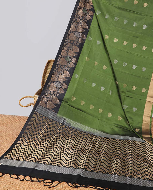 Green leaf buttas soft silk saree with contrast zari border & geometric design pallu
