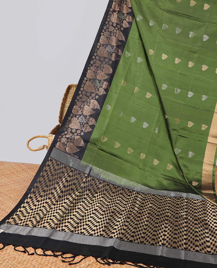 Green leaf buttas soft silk saree with contrast zari border & geometric design pallu