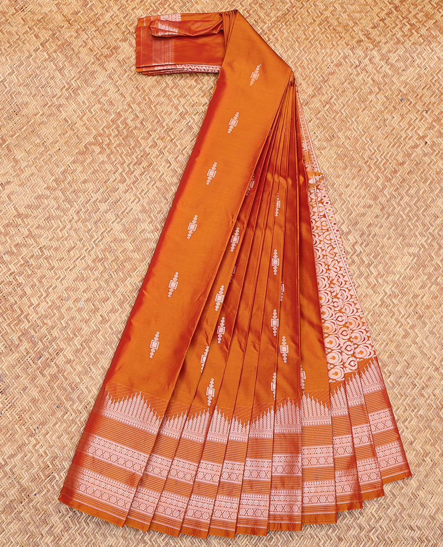 Orange Budget Silk Saree, Delicately Woven with Zari Buttas All Over Its Body, Highlighted by a Traditional Zari Design Border, Intricately Designed Pallu, and Paired with a Matching Blouse