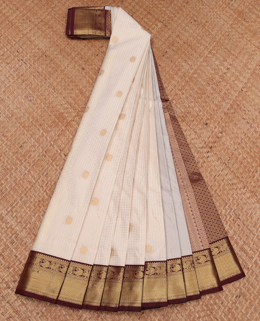 Off-White Budget Silk Saree, Subtly Sparkled with Zari Butta and Checks, Complemented by a Contrast Traditional Zari Border, Jaal Pallu, and Contrast Blouse