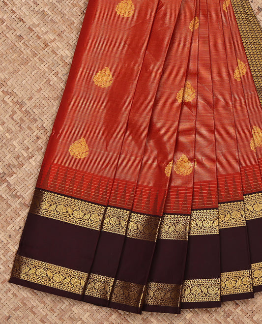 Rust Budget Silk Saree, Boldly Accentuated with Zari Buttas and Stripes on Its Body, Complemented by a Contrast Traditional Zari Design Rettai Pettu Temple Border, Grand Jaal Pallu, and Paired with a Contrast Blouse