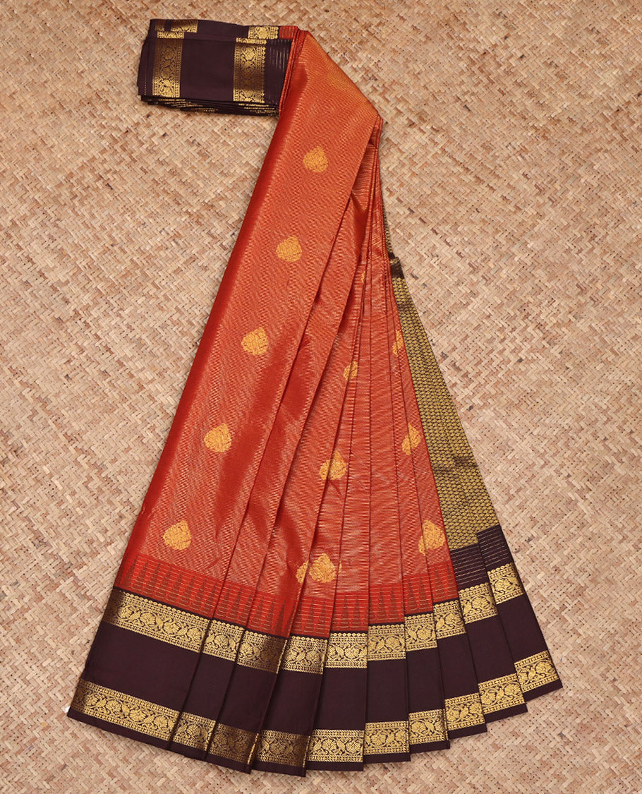 Rust Budget Silk Saree, Boldly Accentuated with Zari Buttas and Stripes on Its Body, Complemented by a Contrast Traditional Zari Design Rettai Pettu Temple Border, Grand Jaal Pallu, and Paired with a Contrast Blouse