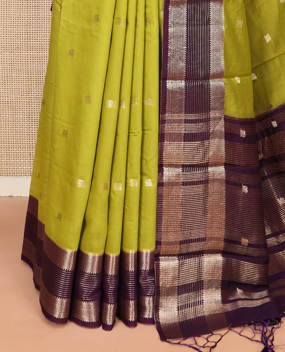 Leaf green peacock buttas Assam silk saree, contrast traditional zari border, and pallu of zari designs