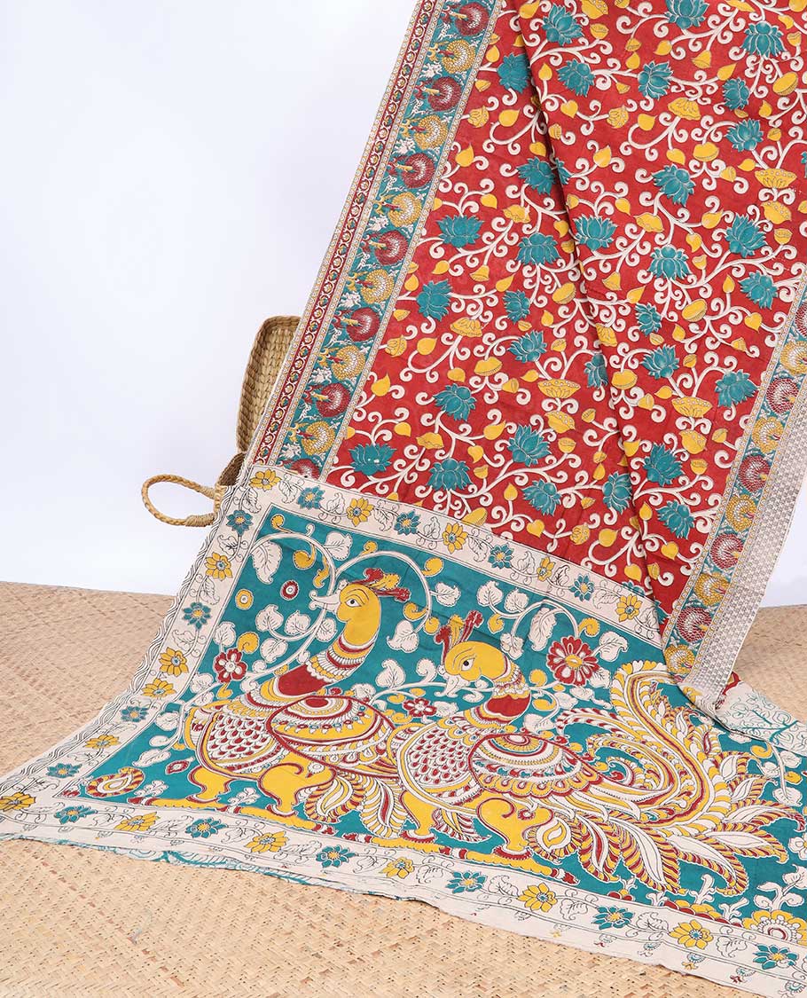 Red floral vine machine-printed kalamkari cotton saree, contrast tree motifs border & peacock pallu