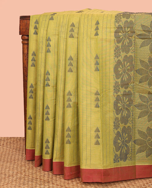 Green Kanchi Cotton Saree, Bedecked with Thread Stripes and Triangle Buttas All Over Its Body, Complemented by Contrast Border, Pallu Featuring Floral Designs, and Paired with a Matching Blouse