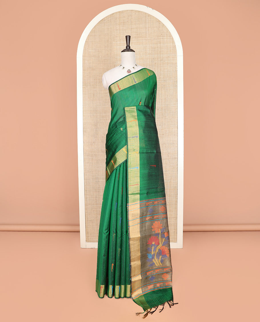 Green Dupion Silk Saree Prettified with Muniya Buttas All Over Its Body, Subtly Self-Zari Border of Muniya Designs, Colorfully Woven Pallu of Floral Motifs, and Paired with a Matching Blouse