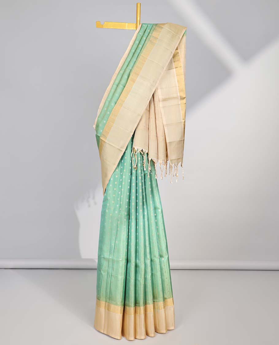 Green small buttas soft silk saree with contrast intricate zari border & geometric zari design pallu