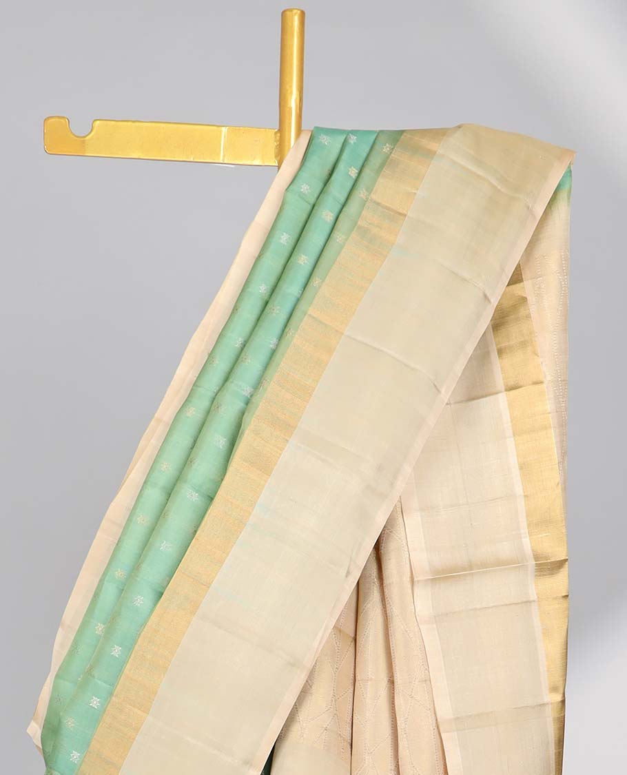 Green small buttas soft silk saree with contrast intricate zari border & geometric zari design pallu