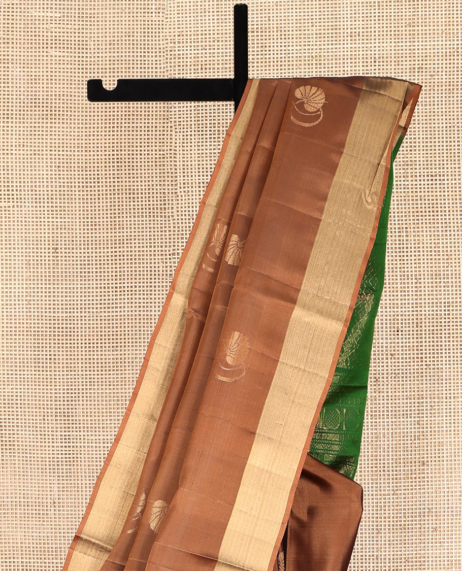 Brown Mayuri Lite Silk Mix Saree, Embellished with zari Buttas All Over Its Body, Highlighted by a Piping Border, Complemented by a Contrast Pallu of Intricate Designs, and Paired with a Contrast Blouse