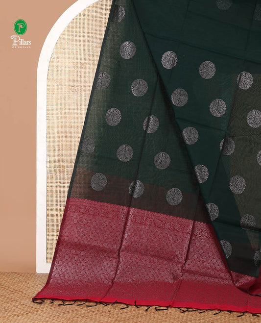 Borderless green silk cotton saree with circular-shaped zari buttas, contrast pallu of floral creeper & jaal design