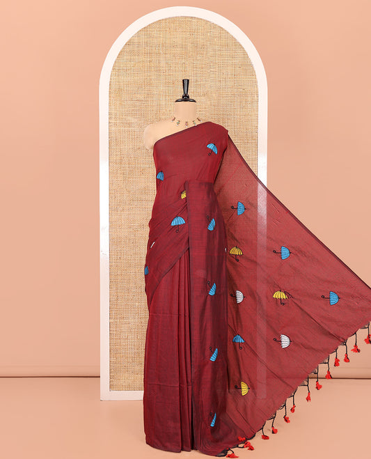 Borderless Maroon Khadi Cotton Saree, Delicately Woven with Umbrella Motifs, Thread Embroidered on Its Body, a Self-Pallu, and Paired with a Matching Blouse