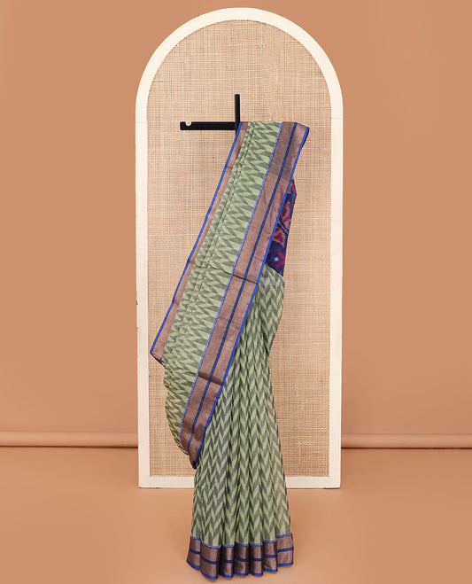 Green ikkat chevron designs silk cotton saree, contrast zari border, and pallu of ikkat designs