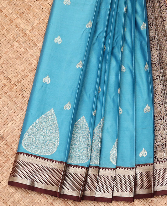 Blue Budget Silk Saree, Adorned with Zari Buttas All Over Its Body, Complemented by Contrast Traditional Zari Designs Woven Border, Grand Pallu, and Paired with a Contrast Blouse