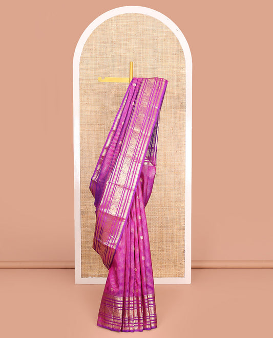 Rani Pink Vasundhara Silk Saree Gleamed Up with Zari Checks and Annam Chakram Buttas, Complemented by a Zari Border of Rekku, Muthu, Kathir, Greek Key, and Mayil Designs, Opulently Embellished Pallu, and Paired with a Matching Blouse
