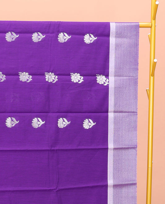 Violet Semi-Silk Cotton Saree, Detailed with Floral Buttas on Its Body, a Subtle Zari Border, Pallu Features Floral Designs, and Paired with a Matching Blouse