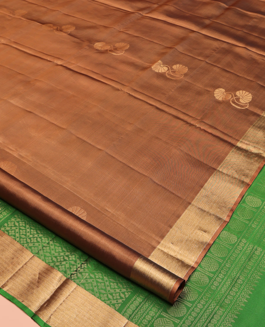 Brown Mayuri Lite Silk Mix Saree, Embellished with zari Buttas All Over Its Body, Highlighted by a Piping Border, Complemented by a Contrast Pallu of Intricate Designs, and Paired with a Contrast Blouse