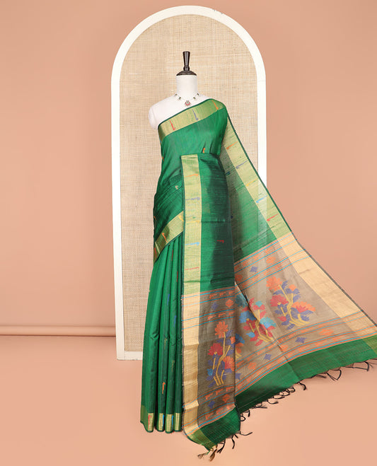 Green Dupion Silk Saree Prettified with Muniya Buttas All Over Its Body, Subtly Self-Zari Border of Muniya Designs, Colorfully Woven Pallu of Floral Motifs, and Paired with a Matching Blouse