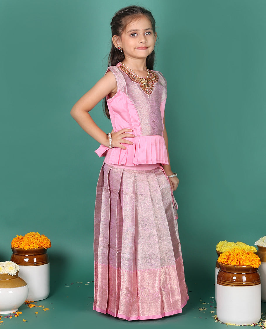 Pink readymade art silk pavadai, jacquard & contrast traditional border skirt, & jacquard embroidery sleeveless round-neck blouse
