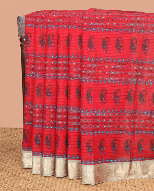 Red Chirala Cotton Saree, Richly Detailed with Triangle, Floral, and Paisley Motifs All Over Its Body, Complemented by a Contrast Chevron Striped Border, Pallu of Floral Print, and Paired with a Contrast Blouse