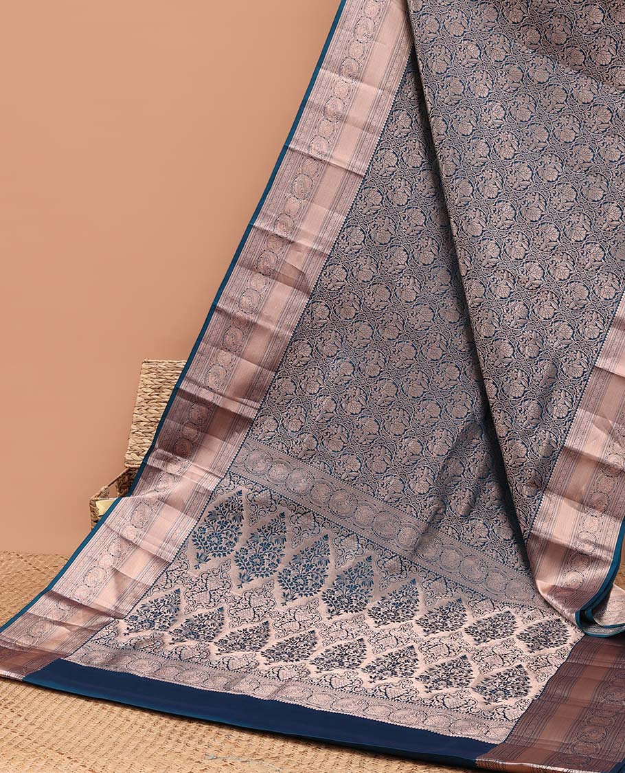 Blue floral jacquard kancheepuram silk saree with self border of muthu, paun, paun design & zari design pallu