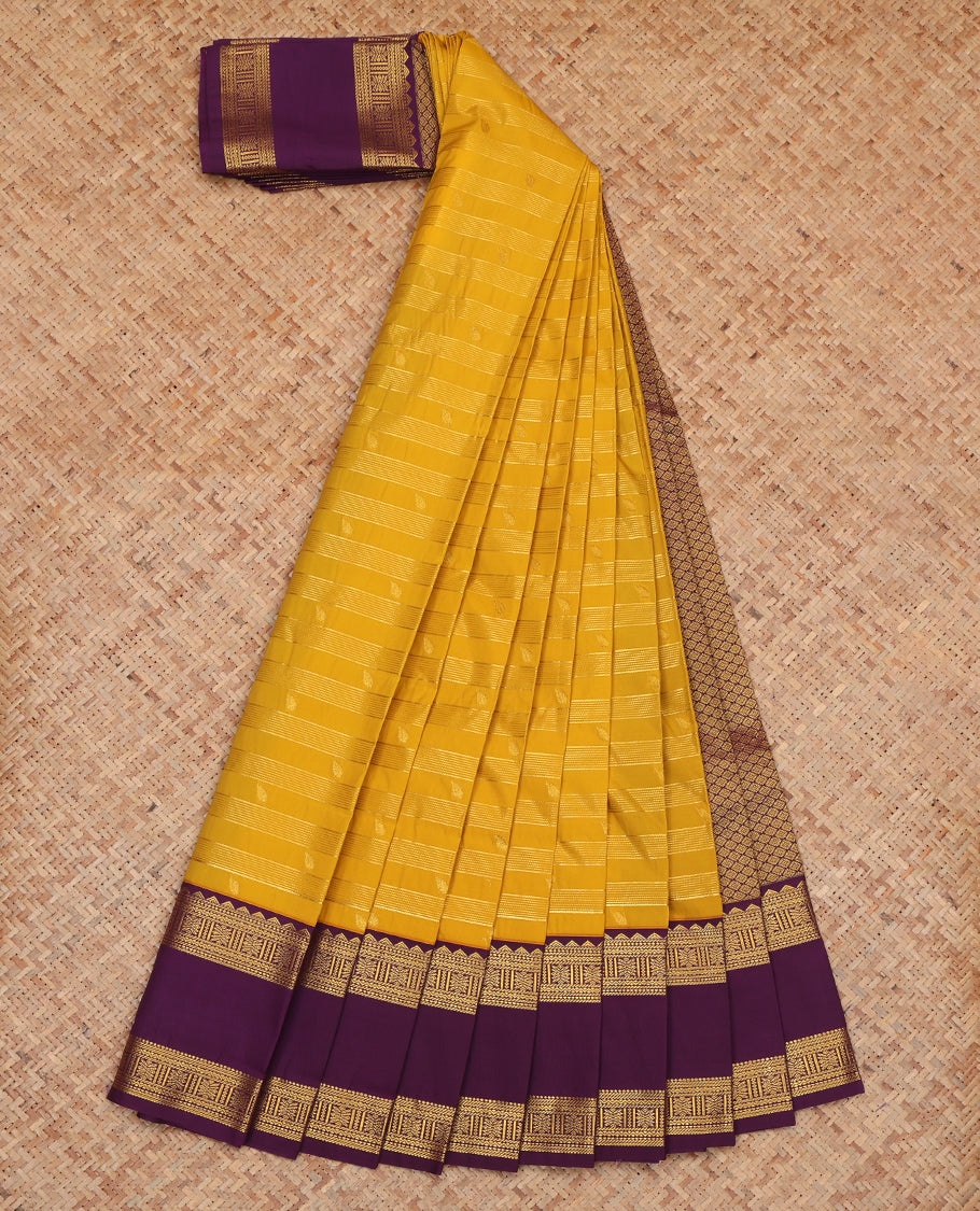 Mustard Budget Silk Saree, Styled with Zari Buttas and Stripes, Complemented by a Contrast Traditional Rettai Pettu Zari Border, Grand Jaal Pallu, and Contrast Blouse