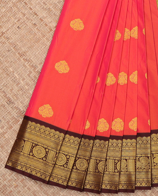 Orange Budget Silk Saree, Beautifully Bedecked with Zari Buttas All Over Its Body, Complemented by Contrast Traditional Border of Peacock-Chakram Designs, Intricate Jaal Pallu, and Paired with a Contrast Blouse