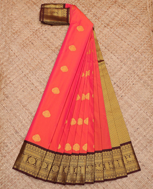 Orange Budget Silk Saree, Beautifully Bedecked with Zari Buttas All Over Its Body, Complemented by Contrast Traditional Border of Peacock-Chakram Designs, Intricate Jaal Pallu, and Paired with a Contrast Blouse