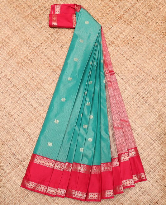 Green Budget Silk Saree, Gleamed Up with Peacock Buttas and Zari Stripes All Over Its Body, Complemented by a Contrast Traditional Zari Design Rettai Pettu Border, a Pallu of Jaal Design, and Paired with a Contrast Blouse