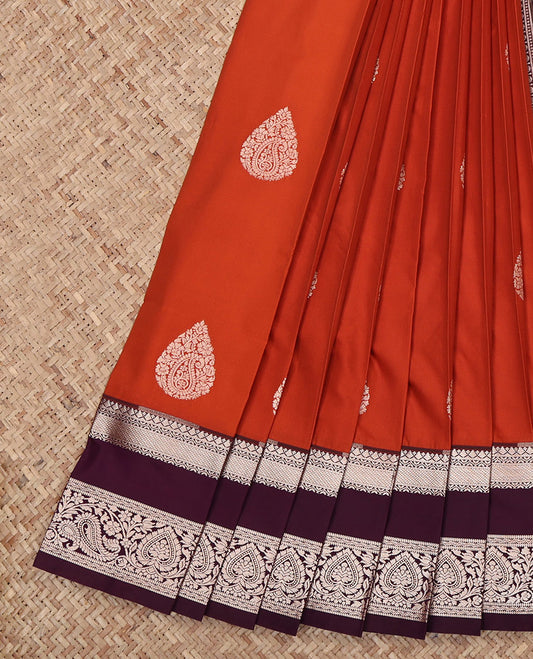 Rust Orange Budget Silk Saree, Showcasing Zari Buttas All Over Its Body, Complemented by a Contrast Traditional Zari Design Rettai Pettu Border, Intricately Designed Pallu, and Paired with a Contrast Blouse