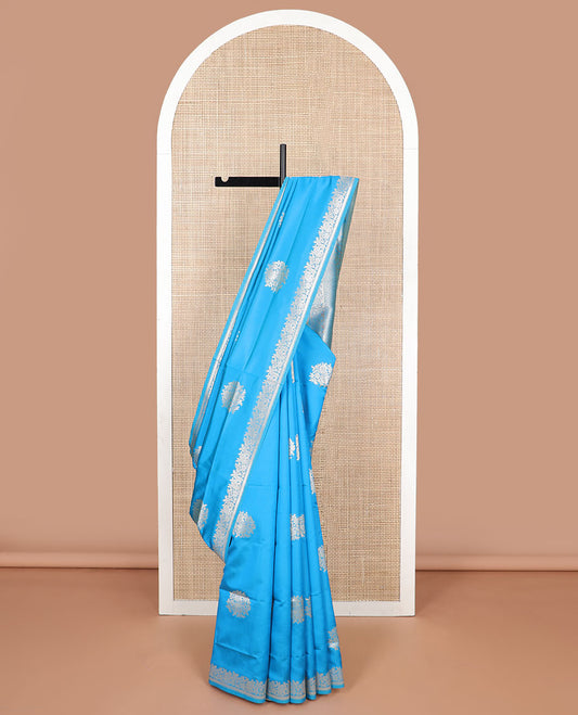 Blue floral motifs butter silk silk saree with self floral zari design border & floral design pallu