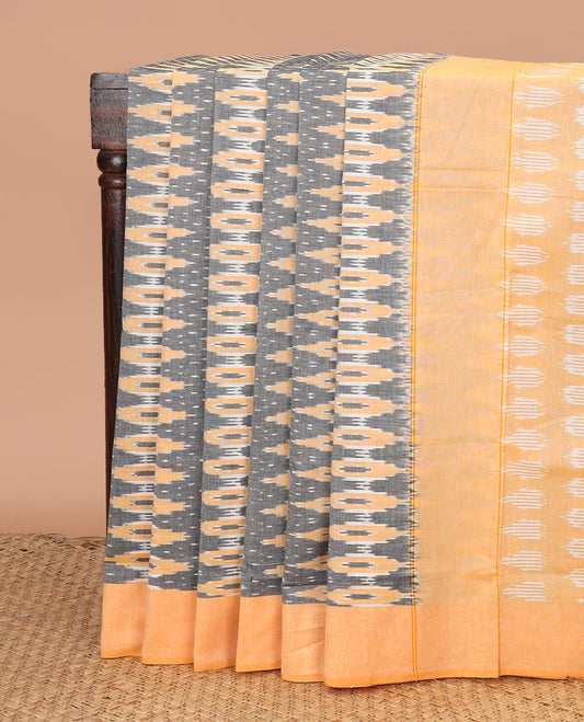 Grey Ikkat Cotton Saree Accentuated with Geometric Patterns in Hazily Ikkat Weave, Complemented by a Contrast Plain Border, and Pallu of Ikkat Patterns