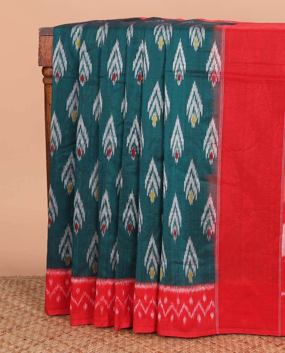 Green buttas ikkat cotton saree, contrast ikkat border, and pallu of big kolam-style design ikkat weave