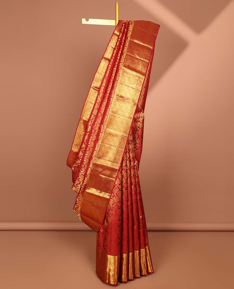 Red floral jacquard kancheepuram silk with self floral border & pallu of argyle pattern